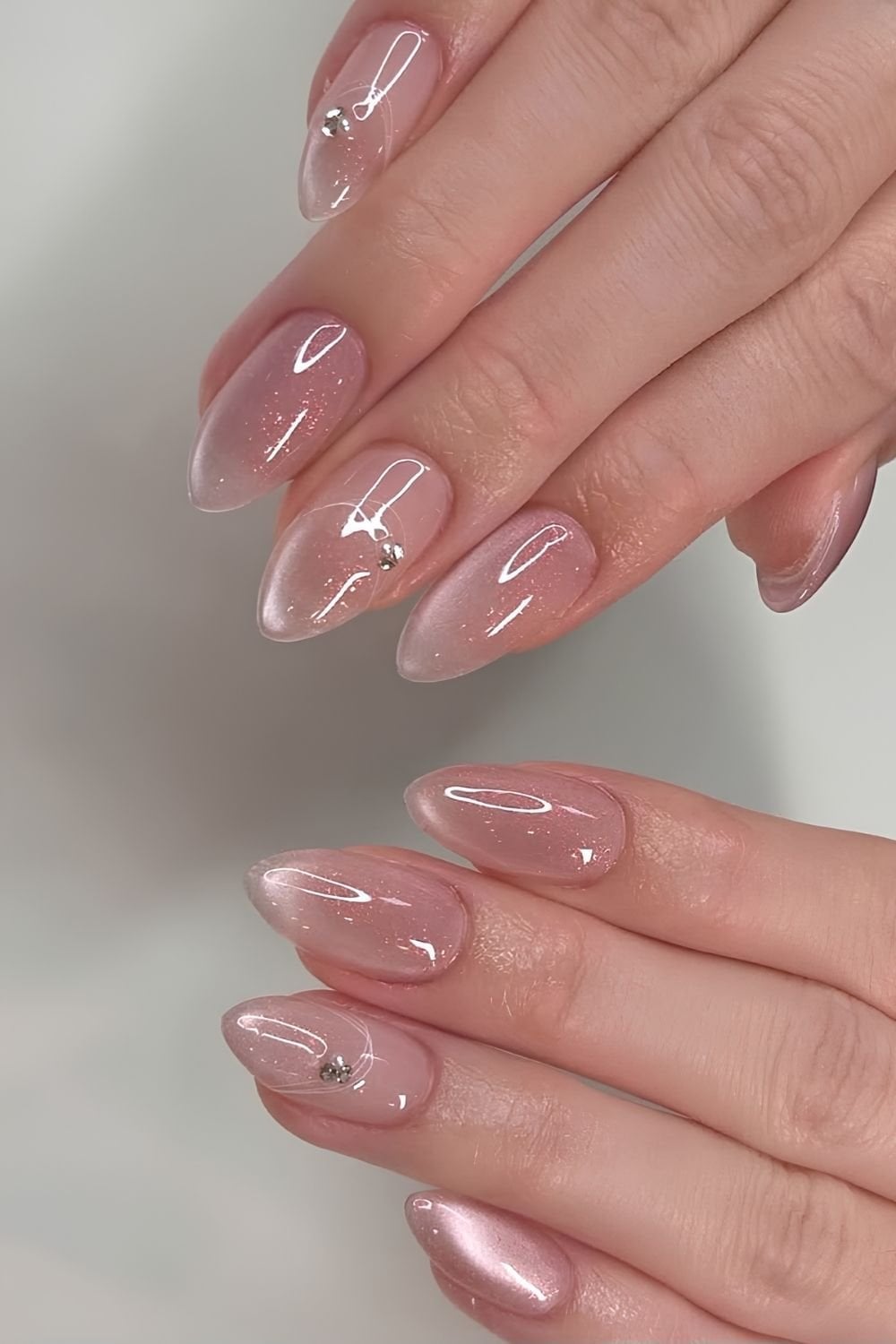 Sheer Pink Oval Nails with Cat-Eye and Rhinestones Sheer Pink Oval Nails with Cat-Eye and Rhinestones — Clean Girl Nails