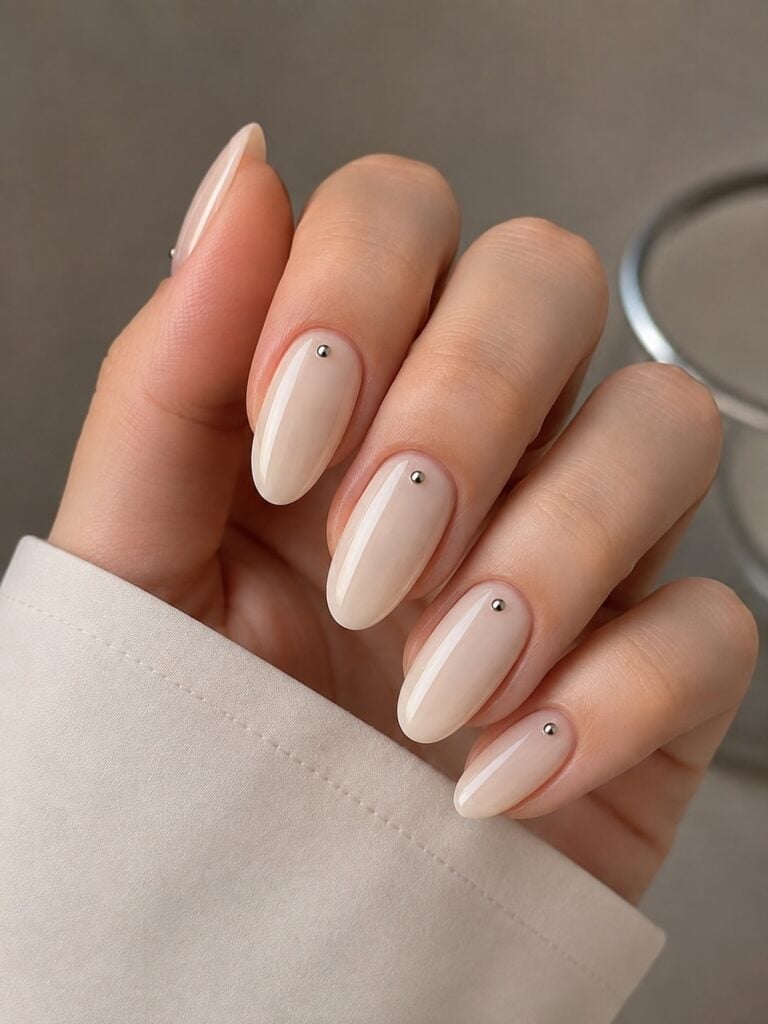 Milky Beige Glossy Short Almond Nails with Studs Milky Beige Glossy Short Almond Nails with Studs — Clean Girl Nails