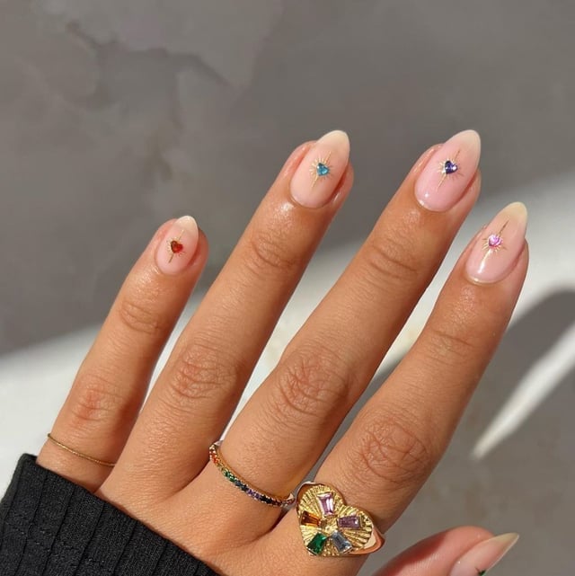 Short Almond Nude Heart Gem Nails Short Almond Nude Heart Gem Nails — College Nails