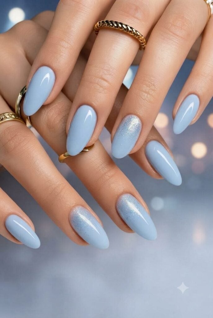 Milky Light Blue Glitter Accent Medium Almond Nails Milky Light Blue Glitter Accent Medium Almond Nails — Concert Nails