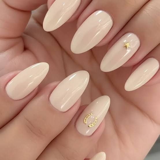 Pale Beige Gold Charms Medium Almond Nails Pale Beige Gold Charms Medium Almond Nails — Concert Nails