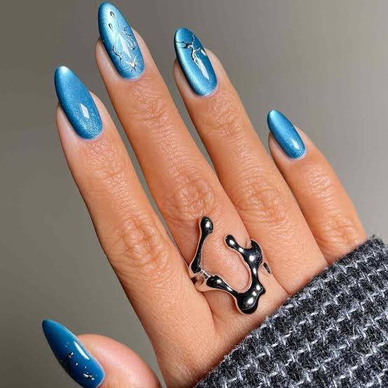 Metallic Blue Cat-Eye Star Accents Long Almond Nails Metallic Blue Cat-Eye Star Accents Long Almond Nails — Concert Nails