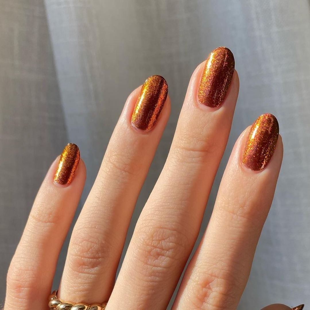 Short Oval Shimmering Copper-Orange Cat Eye — Copper Nails