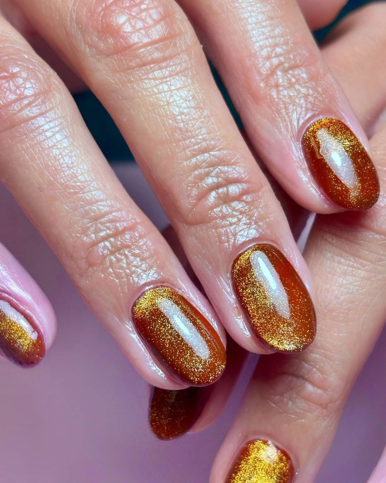Medium Almond Rose Gold Chrome with Gold Foil, Close-Up Take — Copper Nails