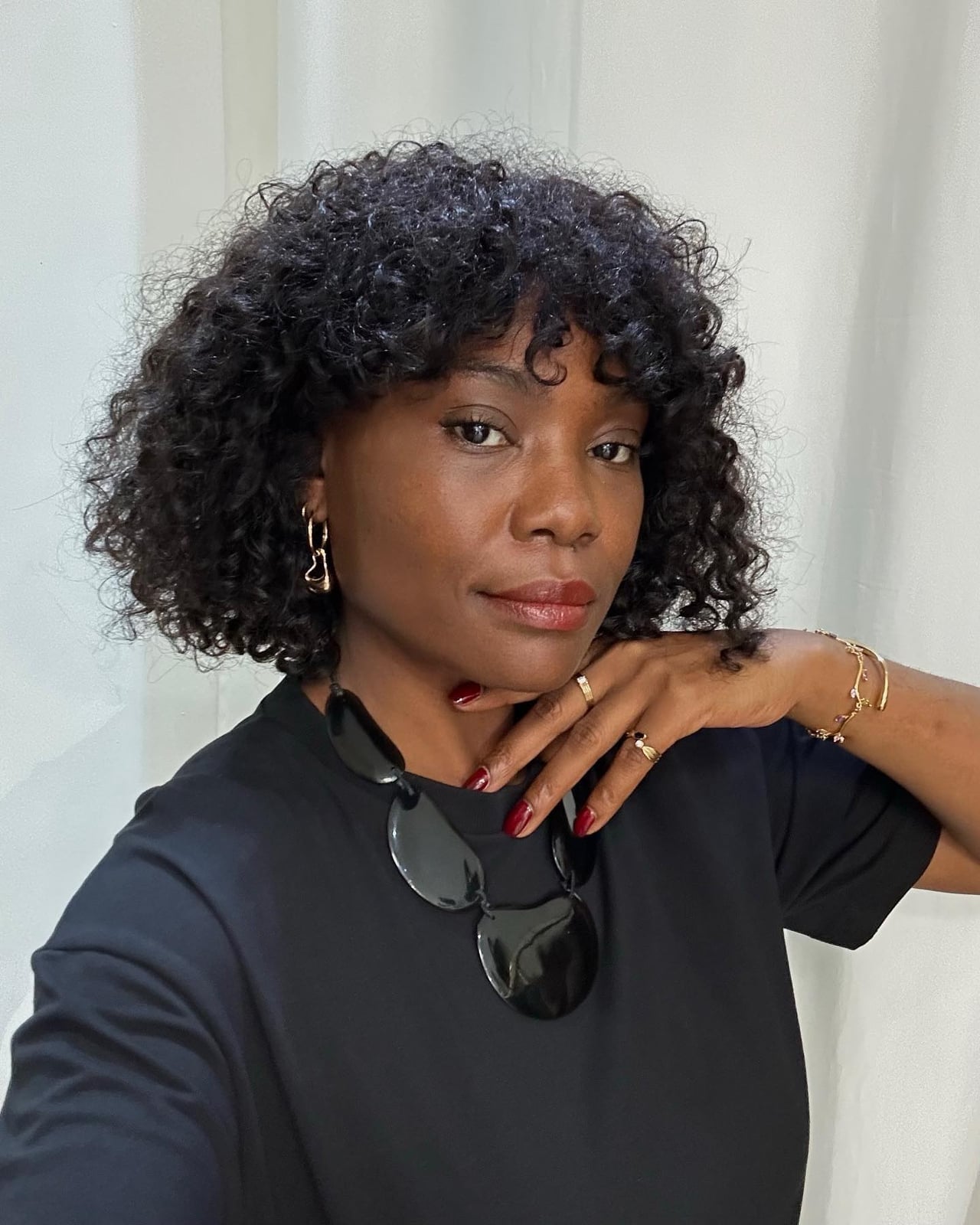 Chin Length Dark Brown Curly Bob Curtain Bangs, Office-Safe Version Chin Length Dark Brown Curly Bob Curtain Bangs, Office-Safe Version