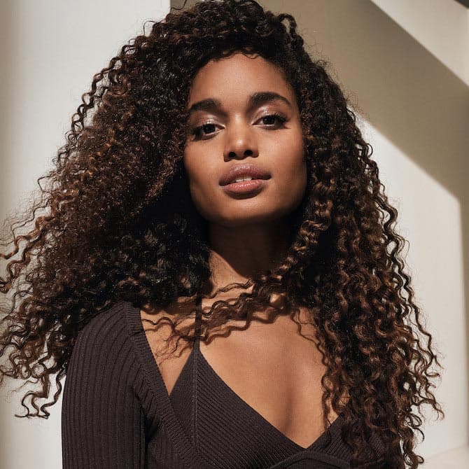 Mid-Back Layered Curly Hair With Caramel Highlights Mid-Back Layered Curly Hair With Caramel Highlights — Curly Haircuts
