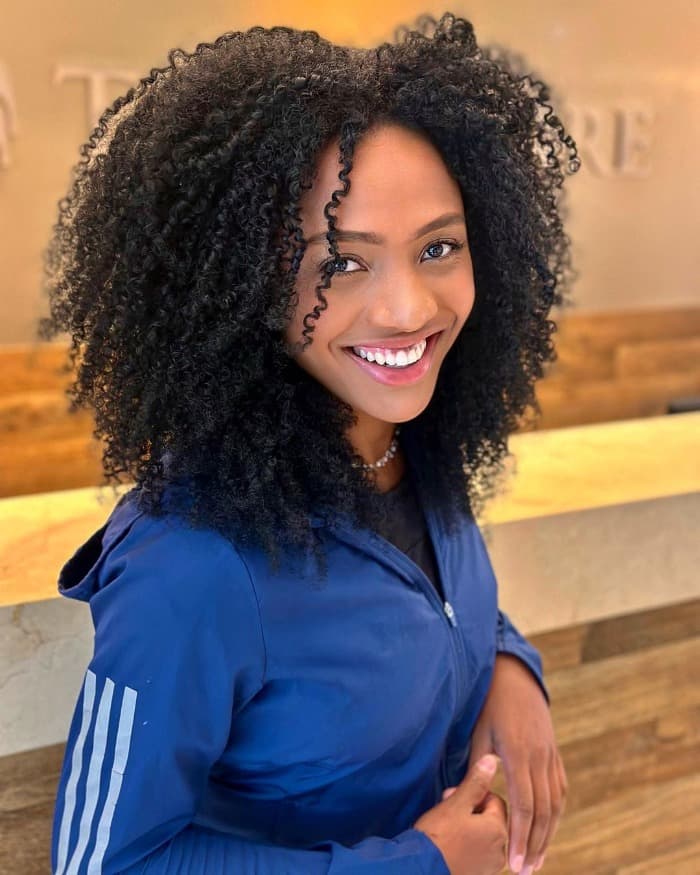 Collarbone Length Layered Black Curls Collarbone Length Layered Black Curls — Curly Haircuts