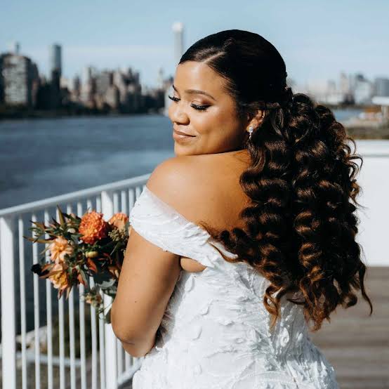 Mid-Back Updo With Side-Swept Bangs Mid-Back Updo With Side-Swept Bangs — Curly Haircuts