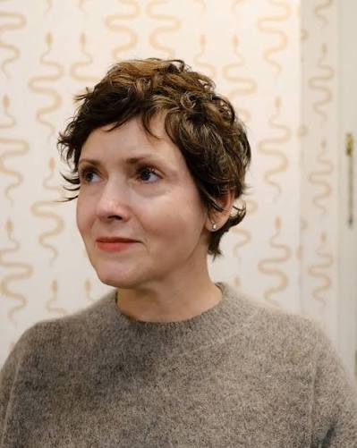 Dark Brown Curly Pixie With Wispy Bangs Dark Brown Curly Pixie With Wispy Bangs