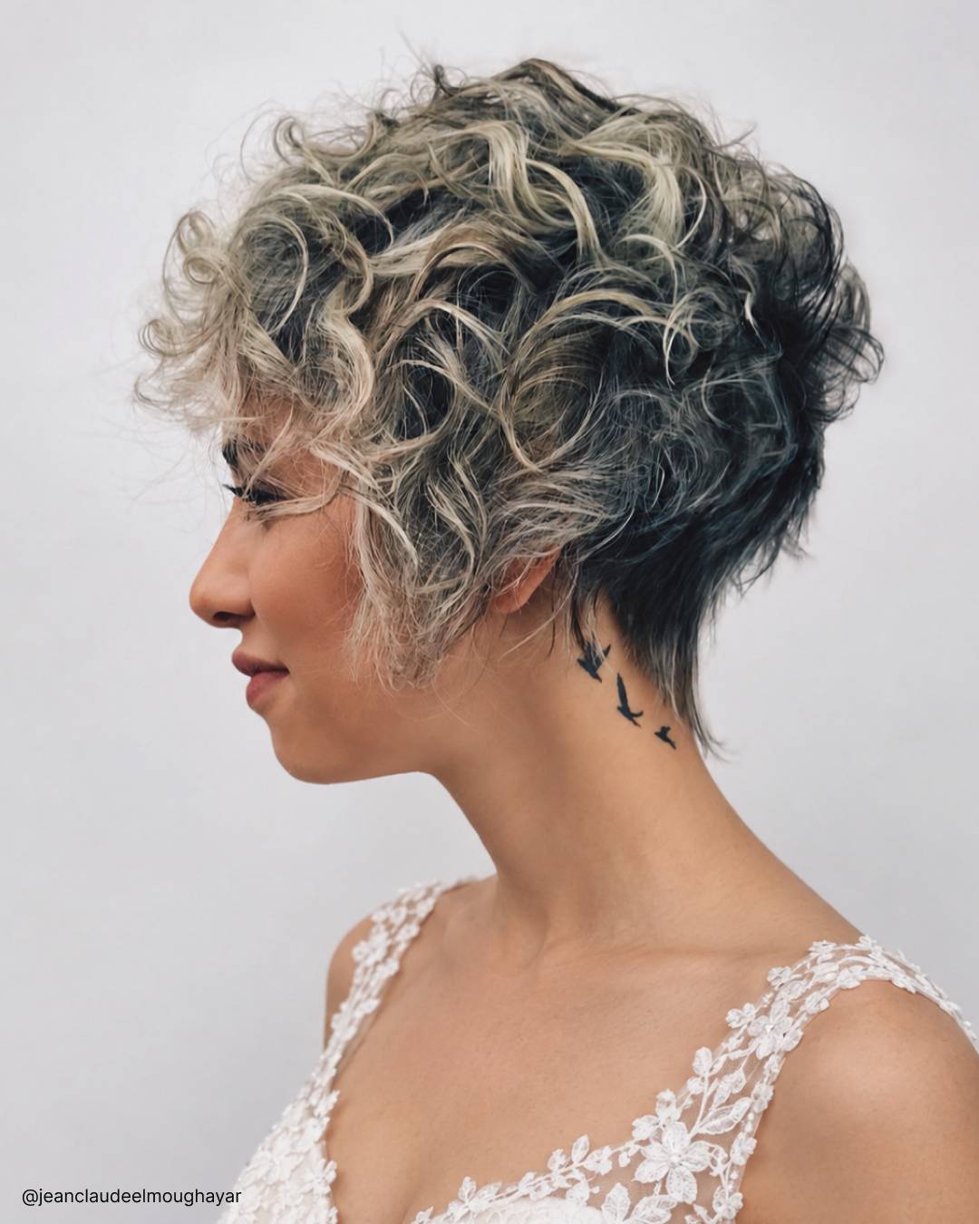 Dark Base Curly Pixie With Blonde Highlights Dark Base Curly Pixie With Blonde Highlights