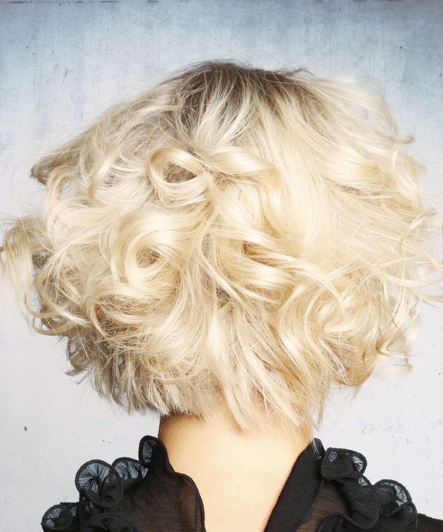 Platinum Blonde Chin Length Curly Shag Platinum Blonde Chin Length Curly Shag