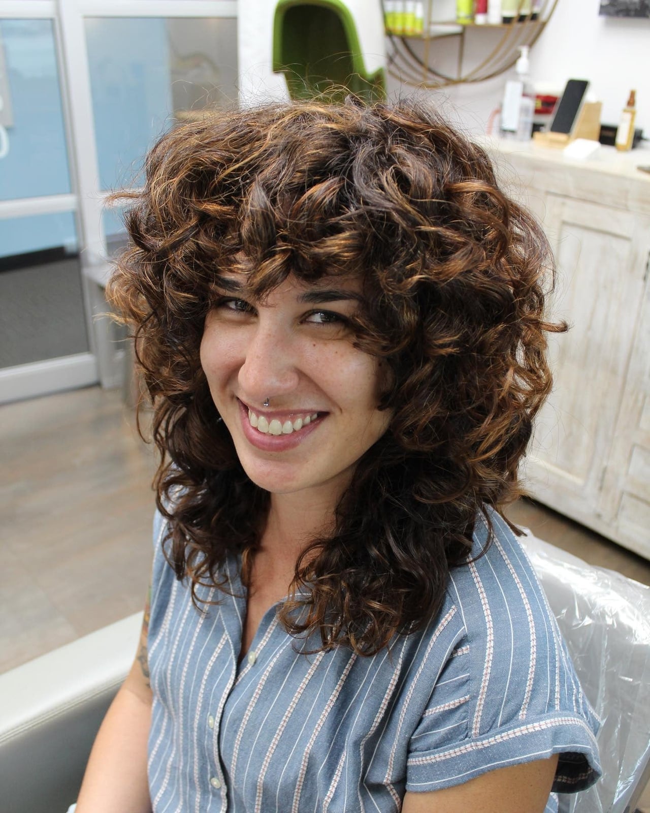 Shoulder Length Dark Brown Wolf Cut With Choppy Layers — Curly Wolf Cut