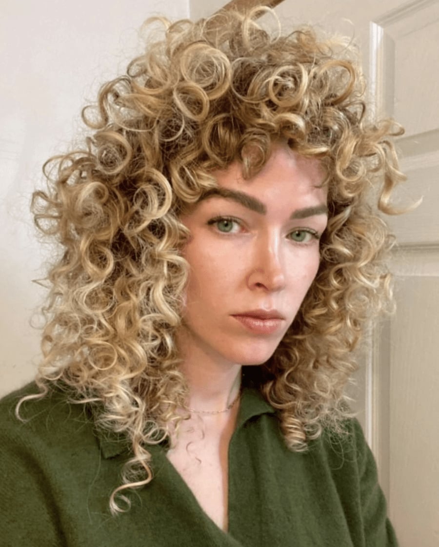 Shoulder Length Ash Blonde Wolf Cut With Wispy Bangs — Curly Wolf Cut