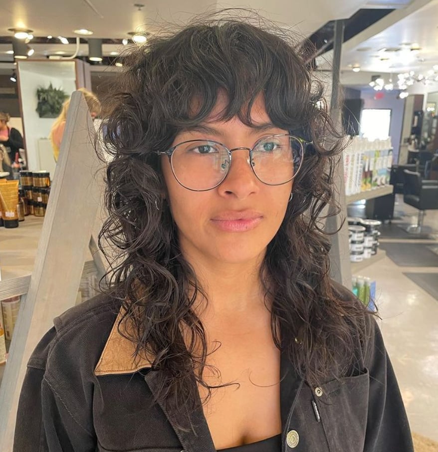 Shoulder Length Dark Brown Wolf Cut With Prominent Bangs — Curly Wolf Cut