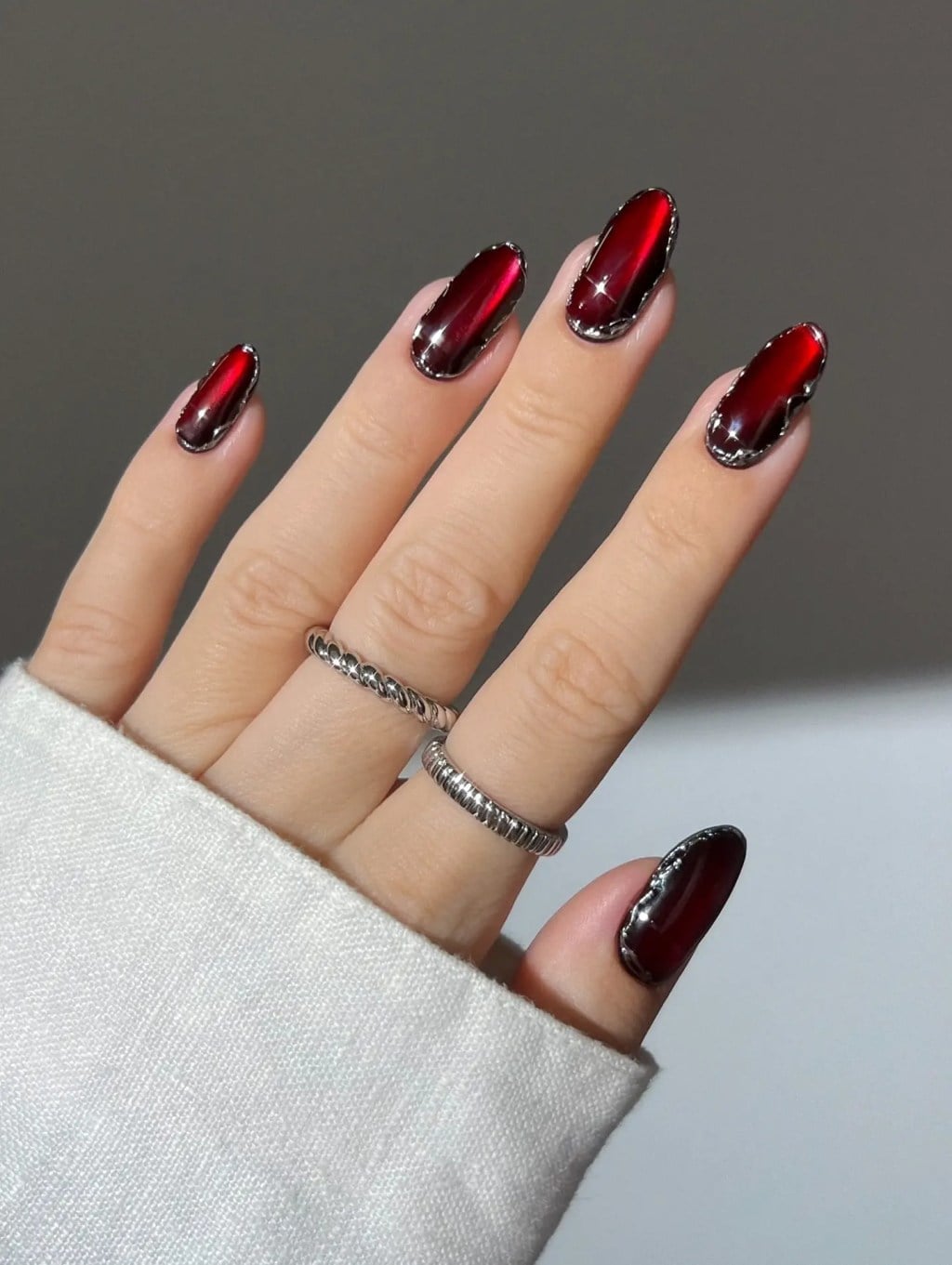Medium Almond Cat Eye With Metallic Border — Dark Red Nails