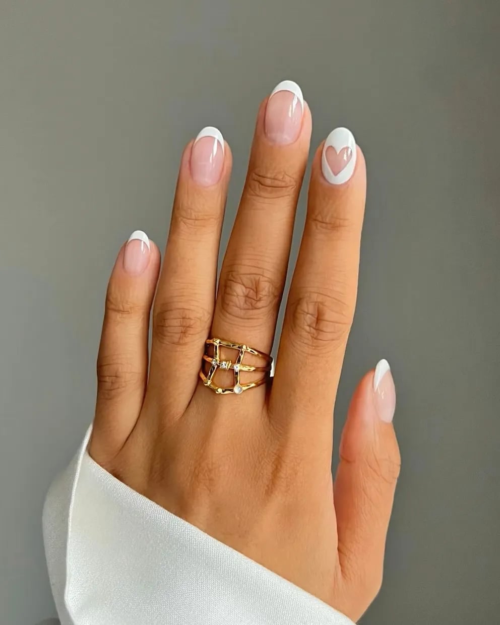 Medium Almond Pink Heart French Tip Nails Medium Almond Pink Heart French Tip Nails — Date Night Nails