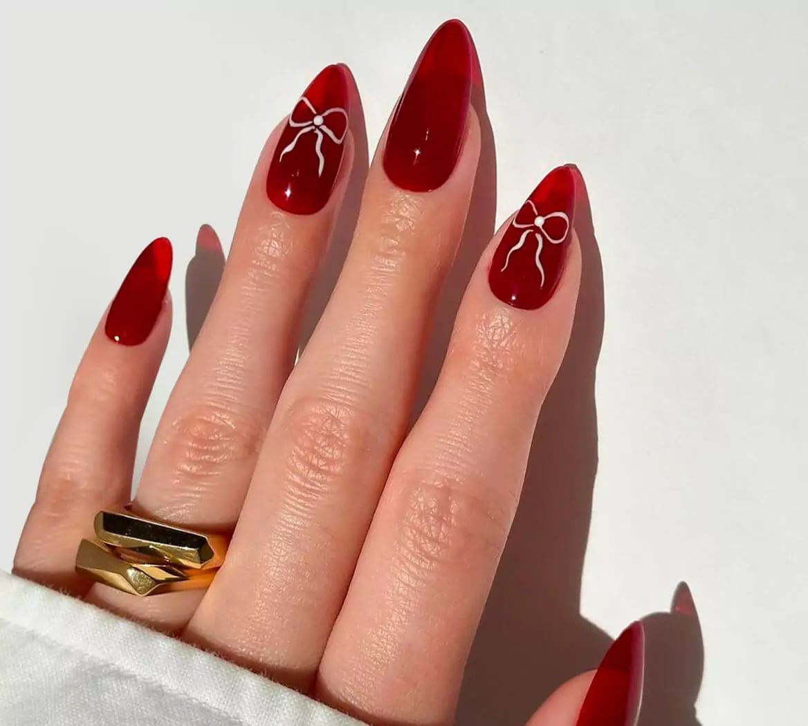 Medium-Long Almond Jelly Red Bow Nails Medium-Long Almond Jelly Red Bow Nails — Date Night Nails
