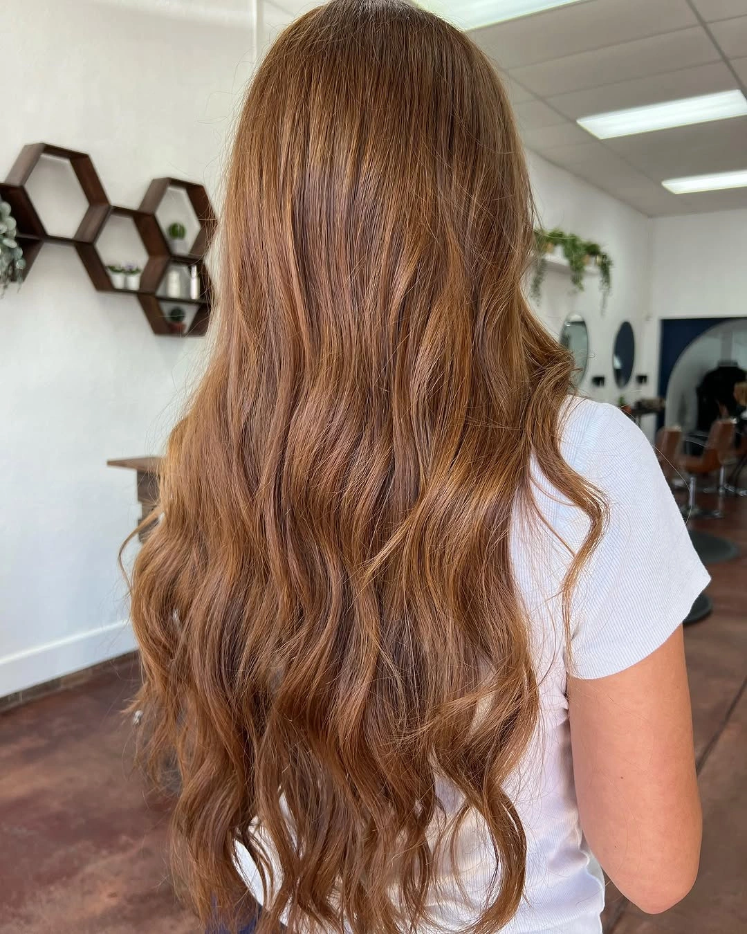 Very long golden brown hair with soft loose waves