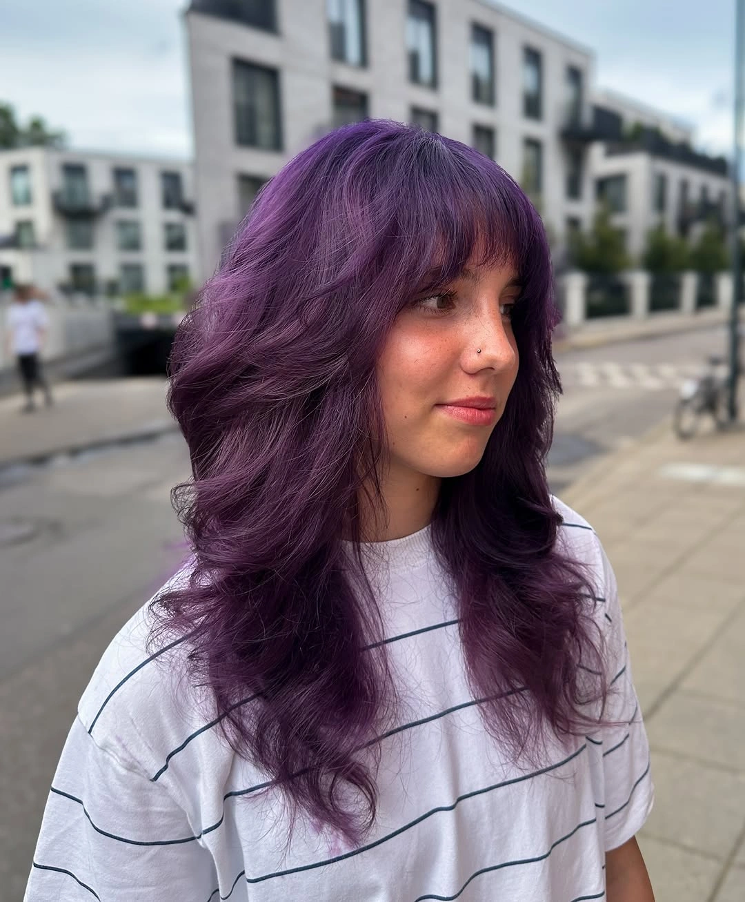 Violet layered waves with a full fringe and darker purple sections