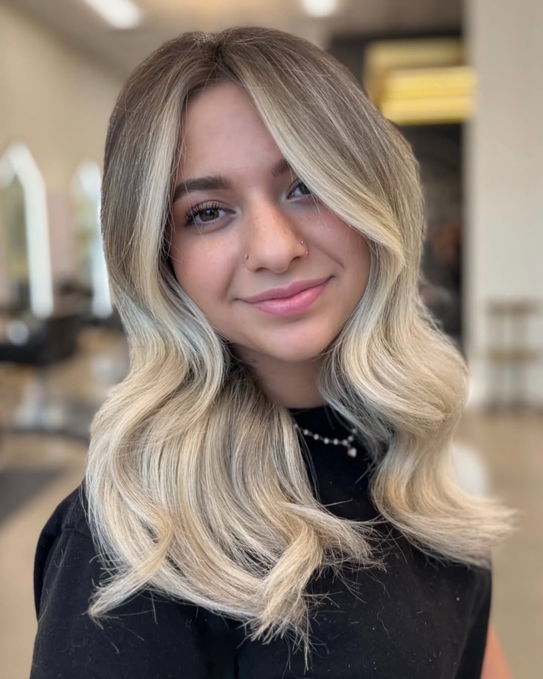 Collarbone Layers With Curtain Bangs And Sun-Kissed Highlights — Dimensional Blonde