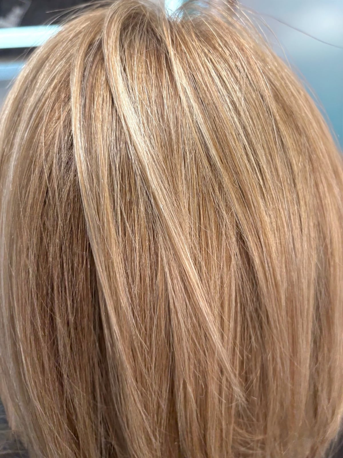 Chin Length Sleek Bob With Subtle Highlights, Close-Up Take — Dimensional Blonde