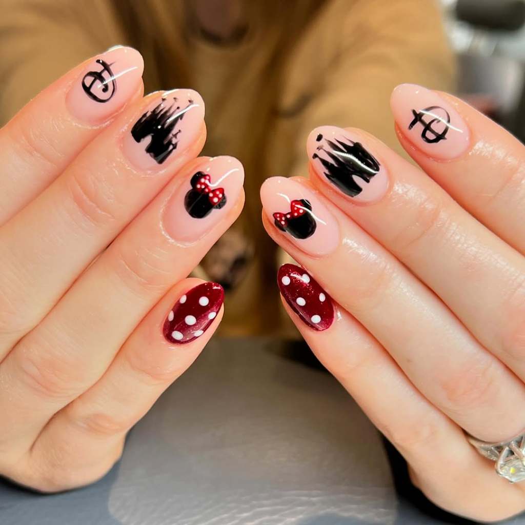 Medium Almond Nude with Black Silhouettes Medium Almond Nude with Black Silhouettes — Disney Nails