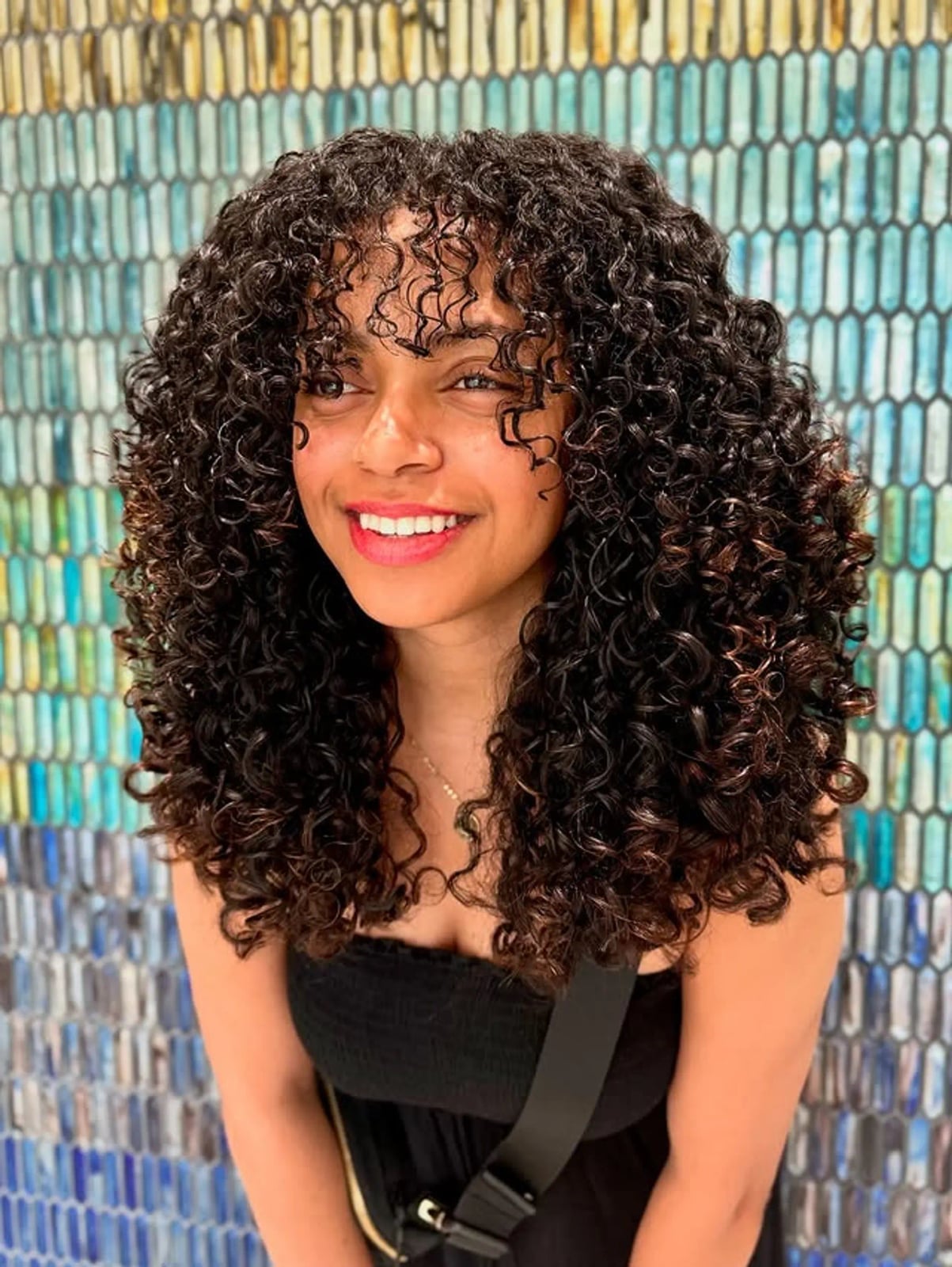 Curly Collarbone Shag With Face Framing Bangs
