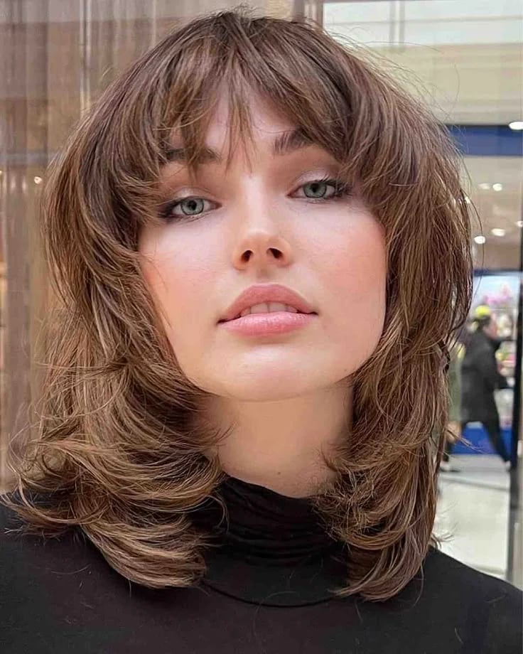 Collarbone Shag With Soft Highlights — Face Framing Bangs