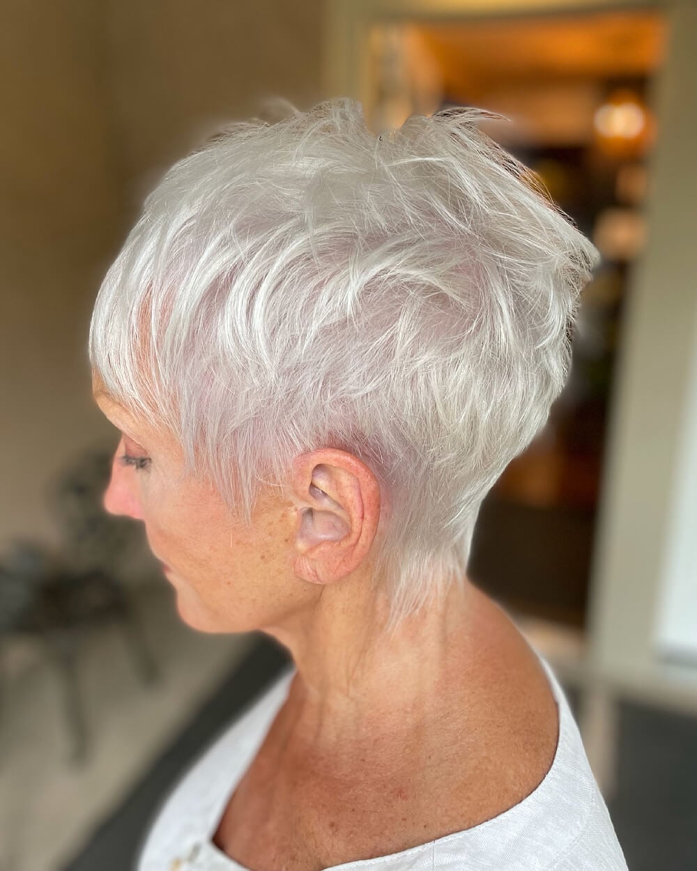 Wavy Gray Pixie With Textured Bangs Wavy Gray Pixie With Textured Bangs