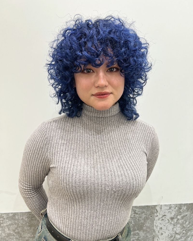 Shoulder Length Shag With Curtain Bangs In Electric Blue Shoulder Length Shag With Curtain Bangs In Electric Blue — Hair Color for Curly Hair