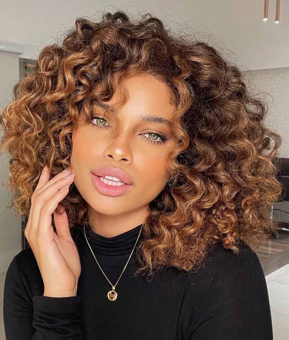 Collarbone Curly Brown With Caramel Highlights Collarbone Curly Brown With Caramel Highlights — Hair Color for Green Eyes