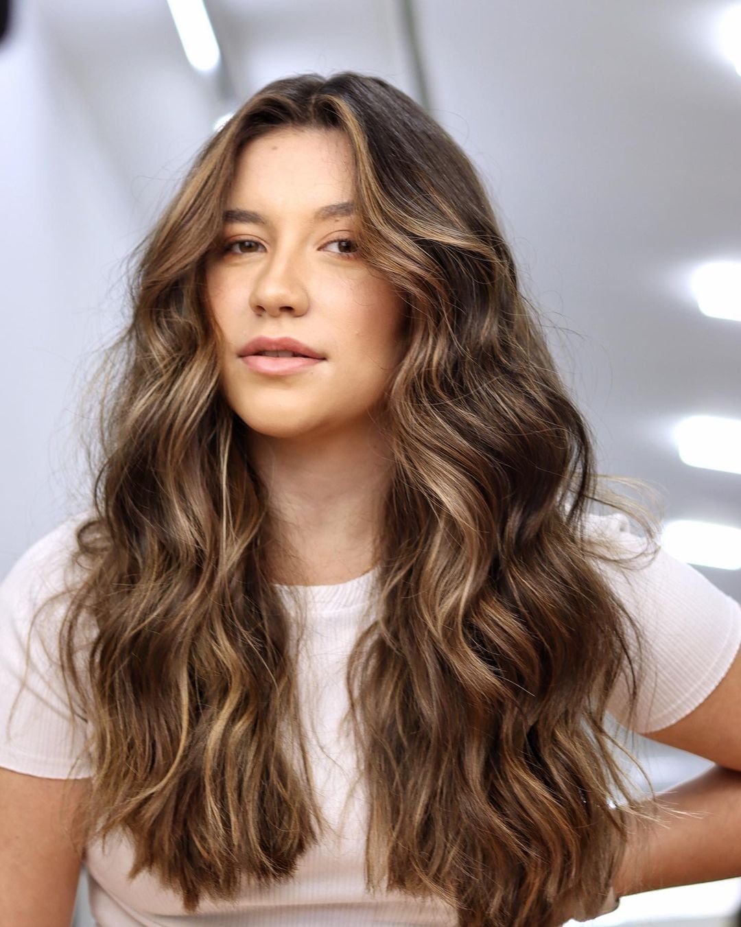 Dark Brown With Caramel Balayage And Curtain Bangs — Hair Color for Olive Skin