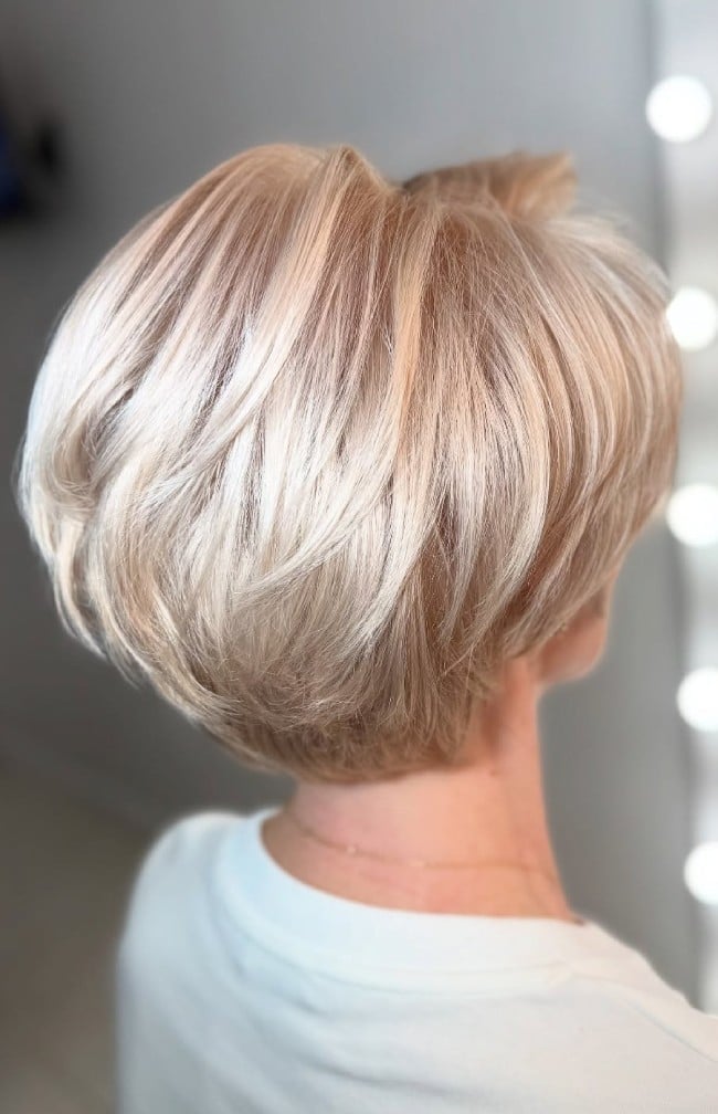 Short Layered Bob In Ash Blonde With Lighter Highlights Short Layered Bob In Ash Blonde With Lighter Highlights — Hair Color for Women Over 50