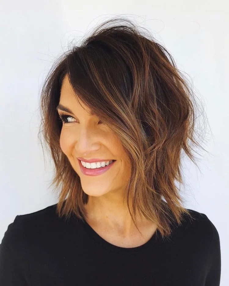 Collarbone Shag With Dark Brown And Caramel Highlights Collarbone Shag With Dark Brown And Caramel Highlights — Hair Color for Women Over 50