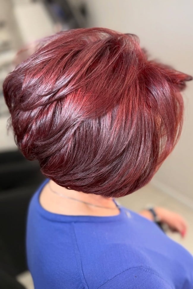 Chin Length Bob In Deep Red With Lighter Red Highlights Chin Length Bob In Deep Red With Lighter Red Highlights — Hair Color for Women Over 50