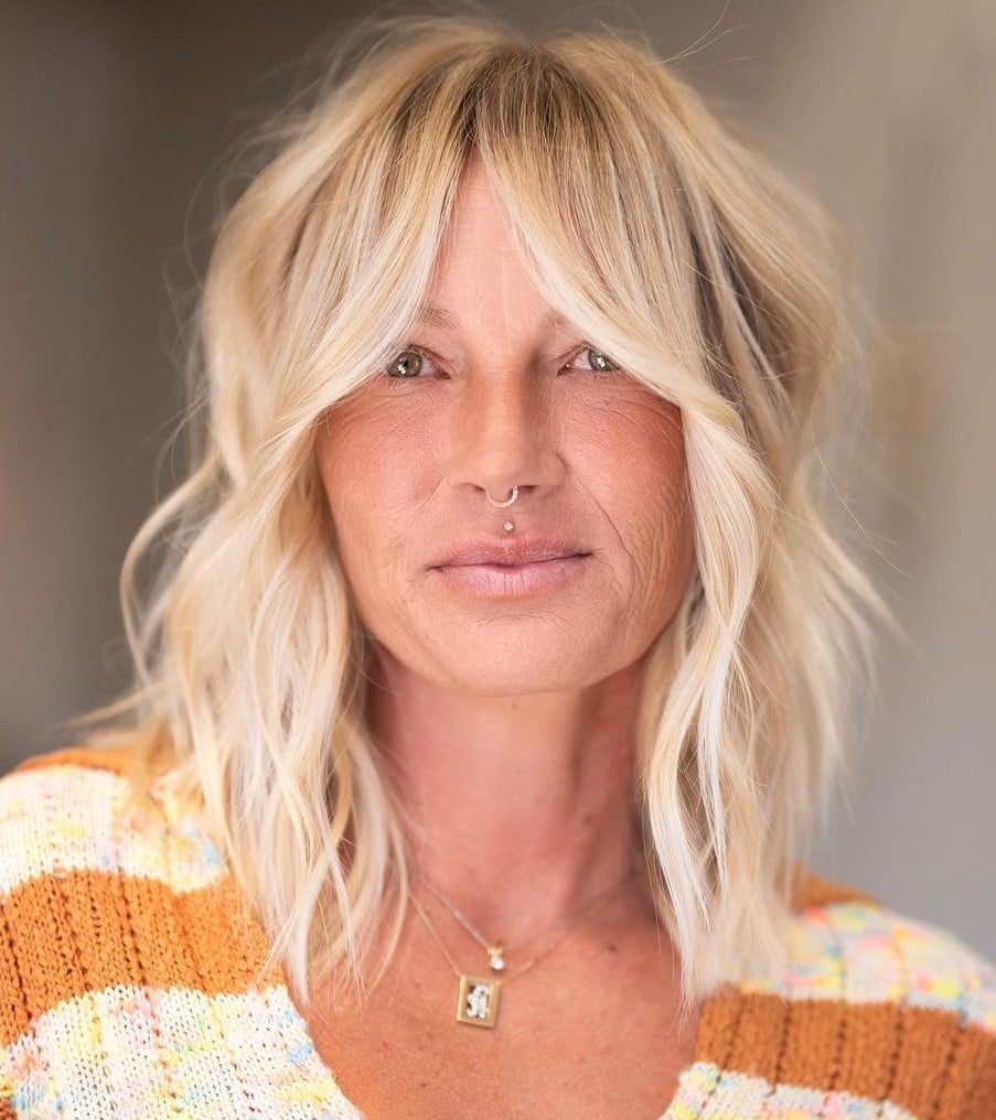 Collarbone Shag With Platinum Blonde And Curtain Bangs Collarbone Shag With Platinum Blonde And Curtain Bangs — Hair Color for Women Over 50