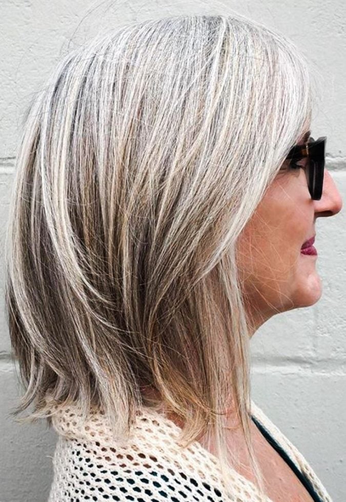Collarbone Gray With Blonde Highlights And Soft Layers Collarbone Gray With Blonde Highlights And Soft Layers — Hair Color for Women Over 60