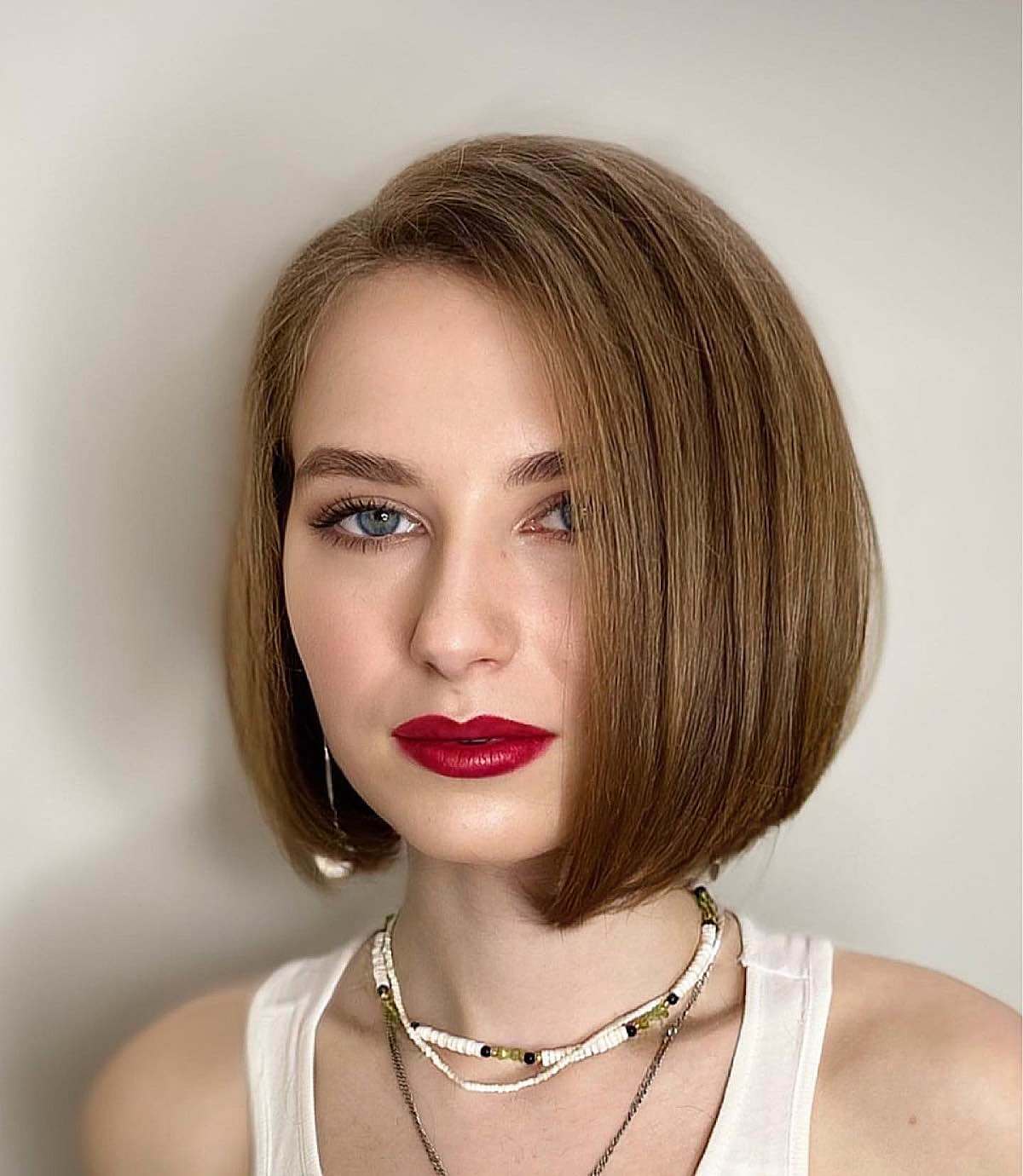 Sleek Medium Brown Chin Bob Sleek Medium Brown Chin Bob — Hair Color Ideas for Short Hair