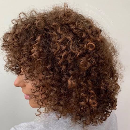 Shoulder-Length Layers With Defined Curls Shoulder-Length Layers With Defined Curls — Haircuts for Curly Hair