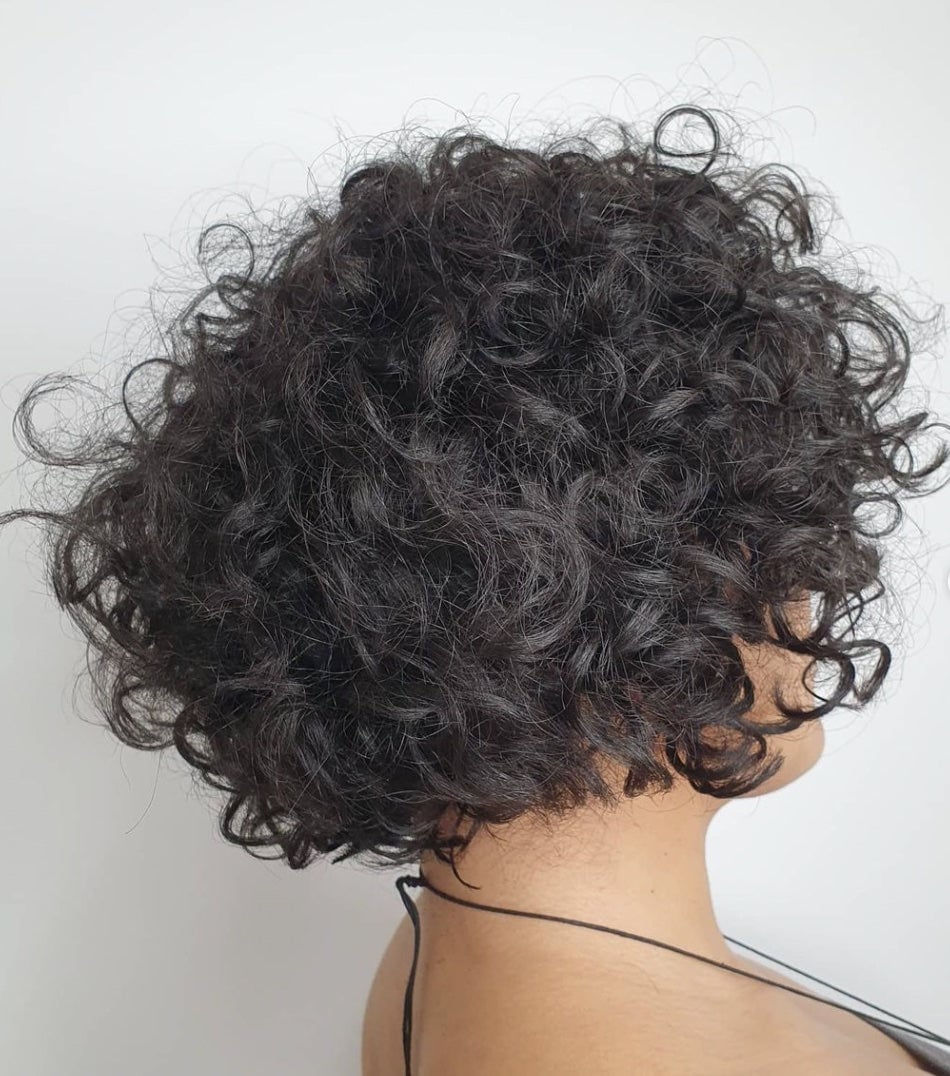 Shoulder-Length Bob With Voluminous Curls Shoulder-Length Bob With Voluminous Curls — Haircuts for Curly Hair