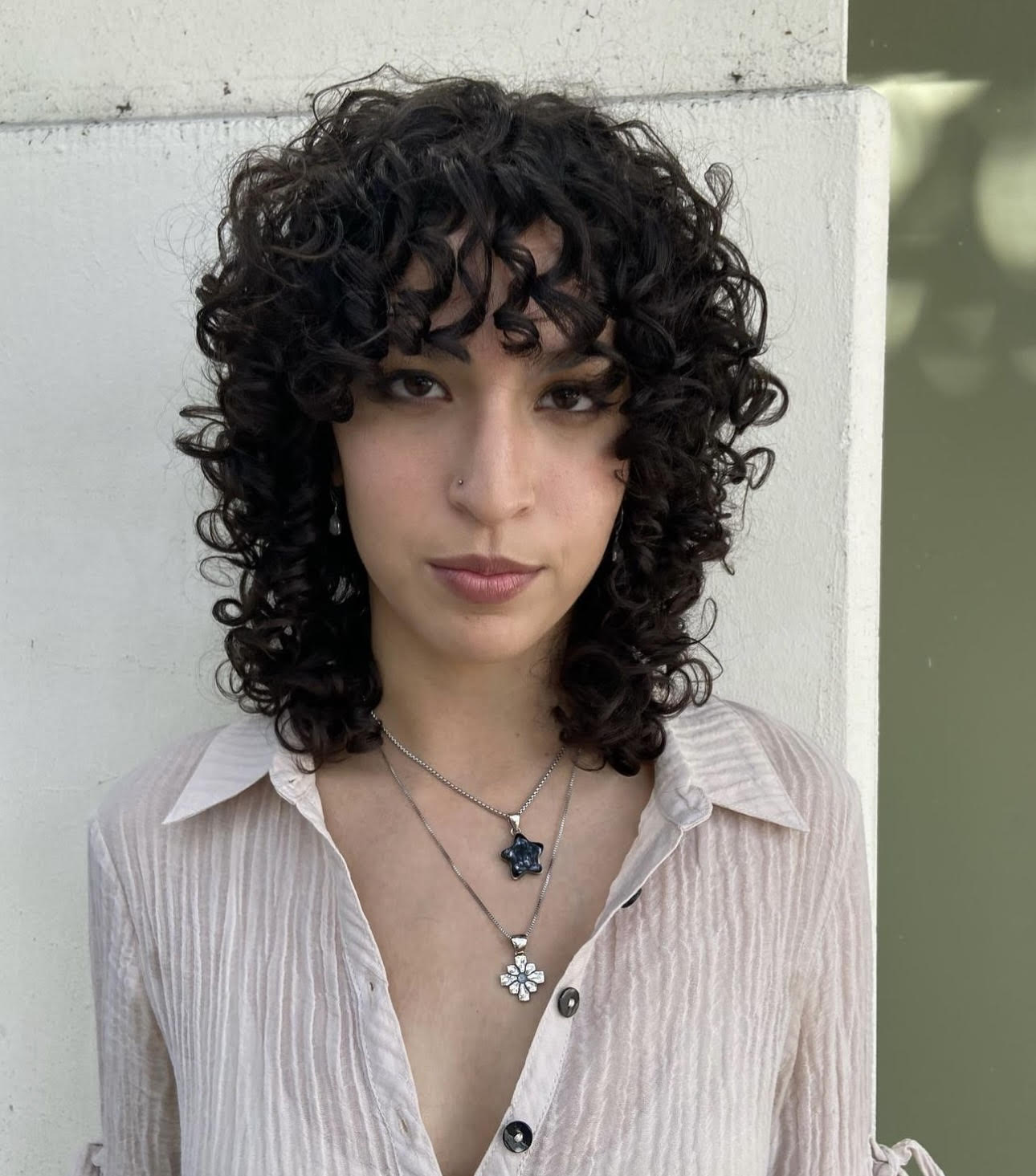 Shoulder-Length Shag With Caramel Highlights Shoulder-Length Shag With Caramel Highlights — Haircuts for Curly Hair