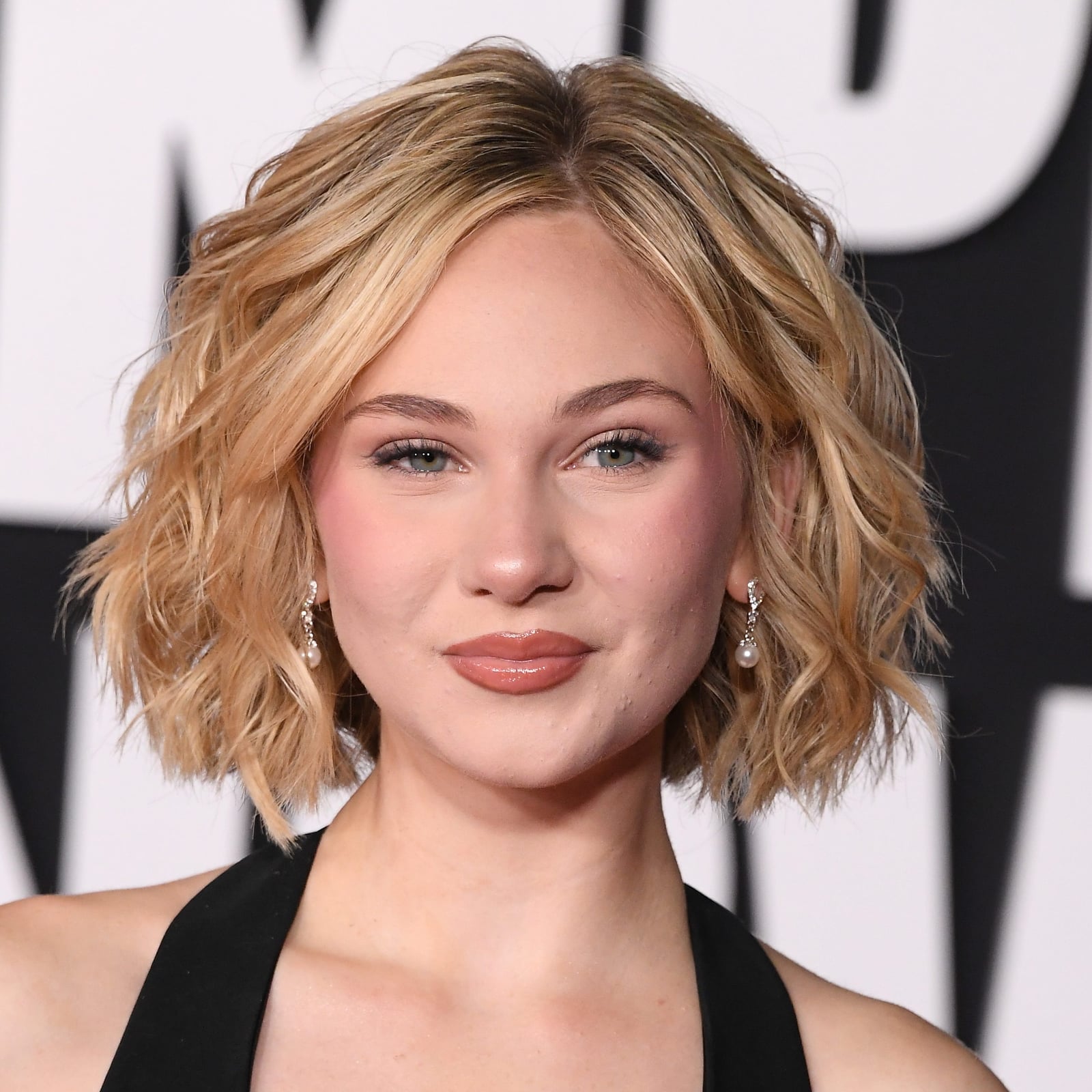 Ash Blonde Wavy Bob With Textured Ends Ash Blonde Wavy Bob With Textured Ends — Haircuts for Wavy Hair