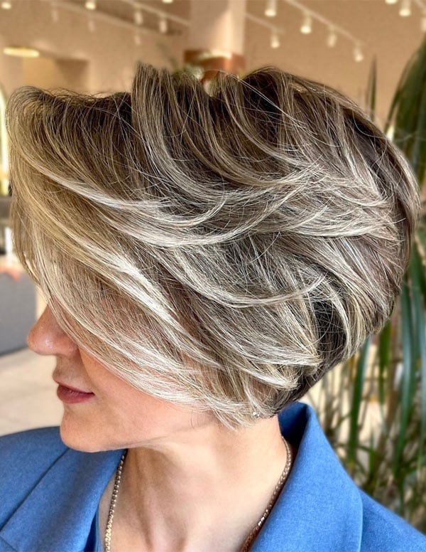 Chin Length Layered Bob With Side Swept Bangs Chin Length Layered Bob With Side Swept Bangs — Haircuts for Women Over 40