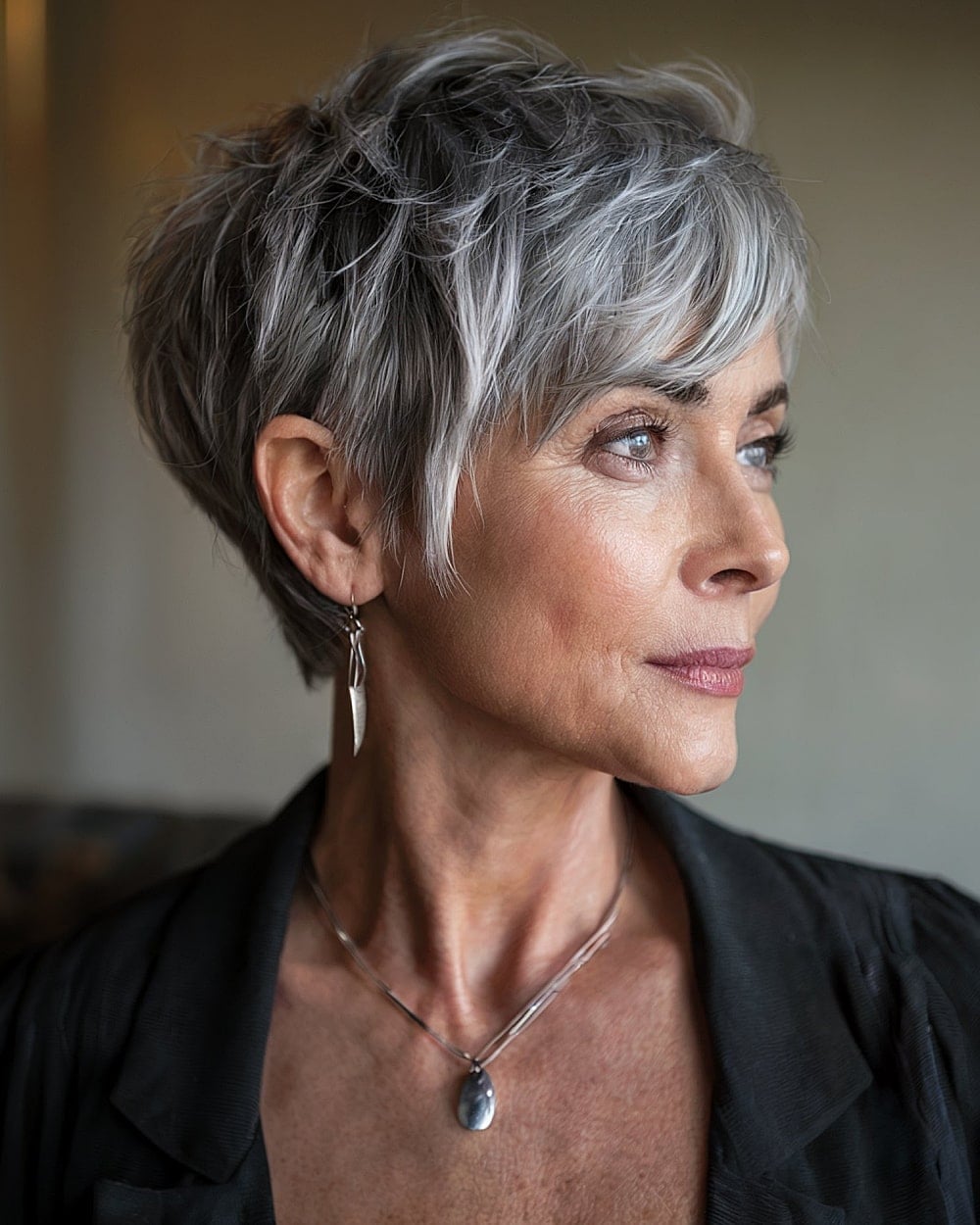 Choppy Gray Pixie With Side Swept Bangs Choppy Gray Pixie With Side Swept Bangs — Haircuts for Women Over 50