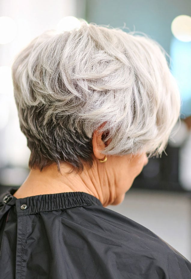 Silver Gray Layered Bob With Side Swept Bangs, Chin — Haircuts for Women Over 70