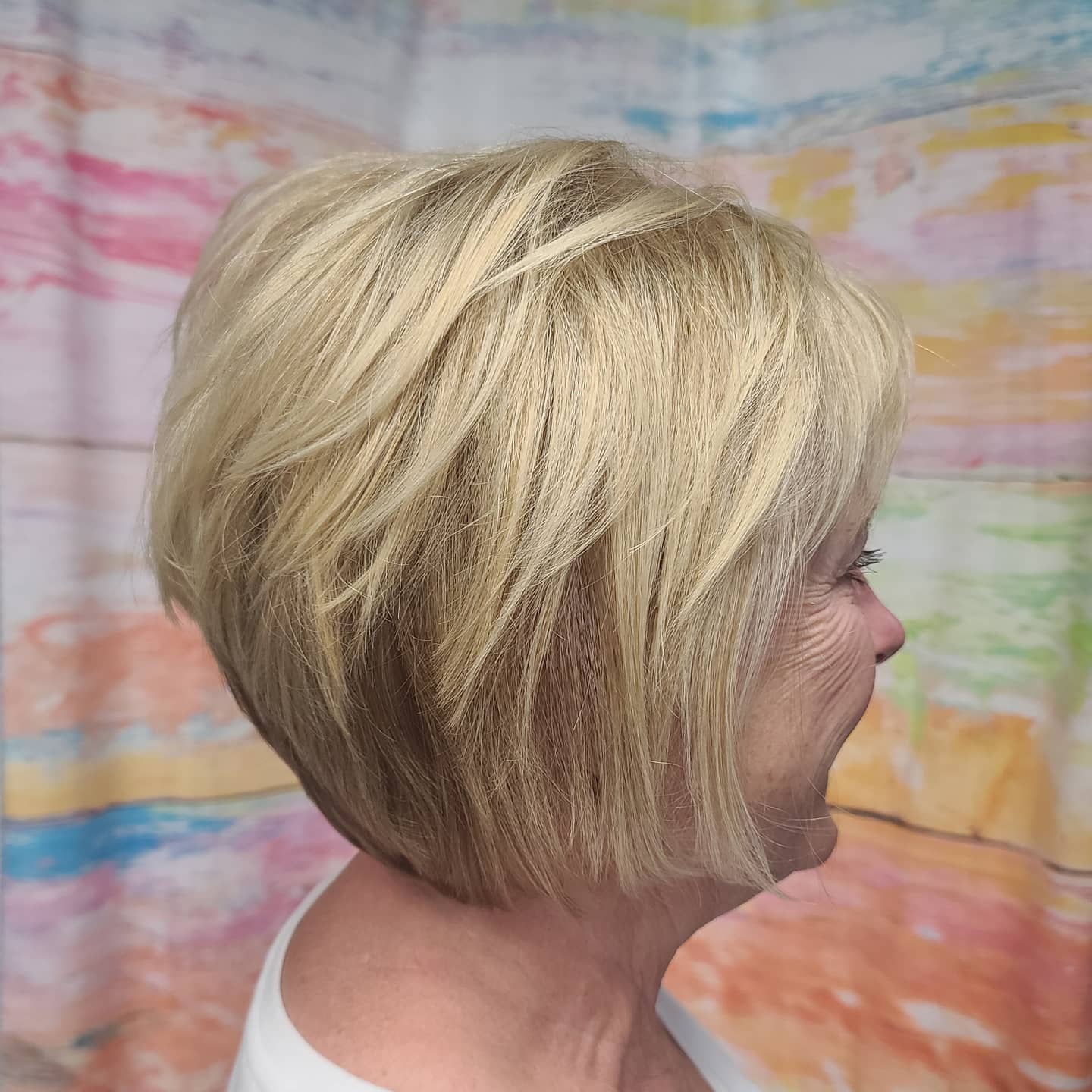 Blonde Bob With Feathered Layers — Haircuts for Women Over 70