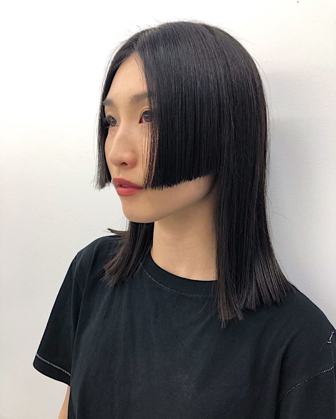 Shoulder Length Black Hime Cut With Cheekbone Sections