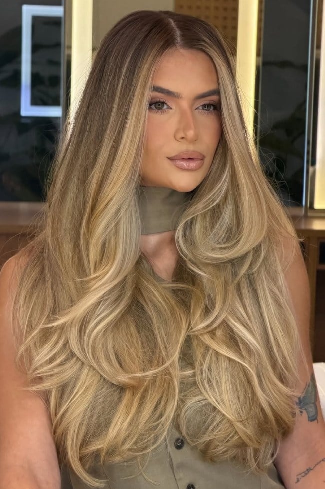 Mid-Back Blowout With Honey Blonde Balayage and Curtain Bangs — Honey Balayage