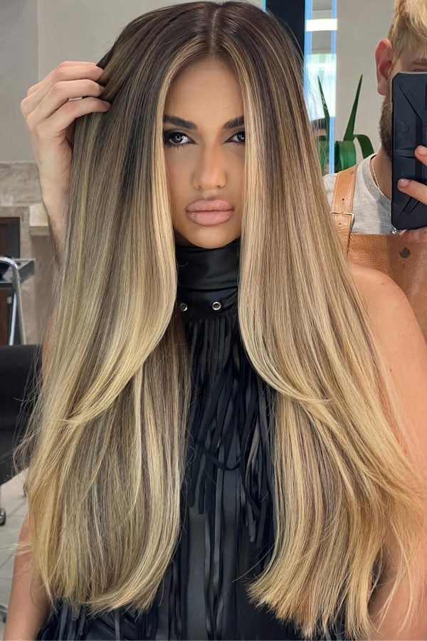 Long Honey Blonde With Subtle Highlights and Waves