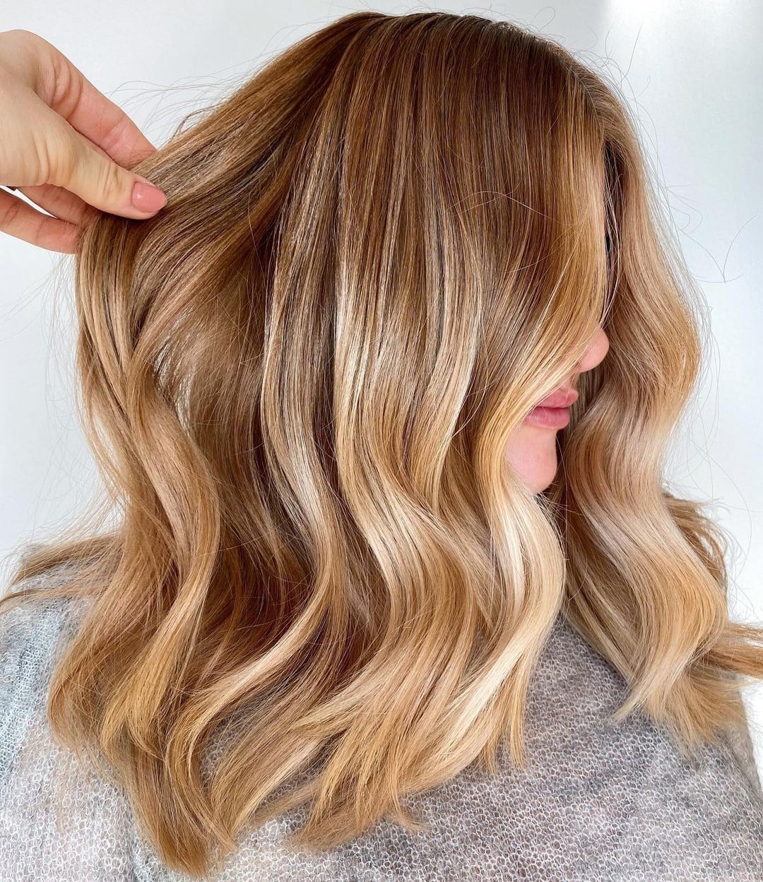 Shoulder Length Honey Blonde With Face-Framing Bangs